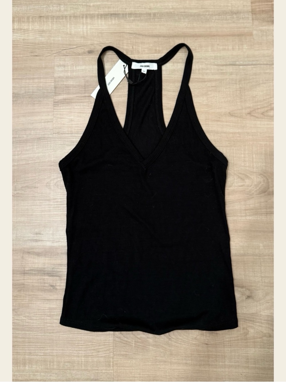 Joah Brown
Black V- Neck Racerback Tank, NWT!
Cross listed on Mercari!